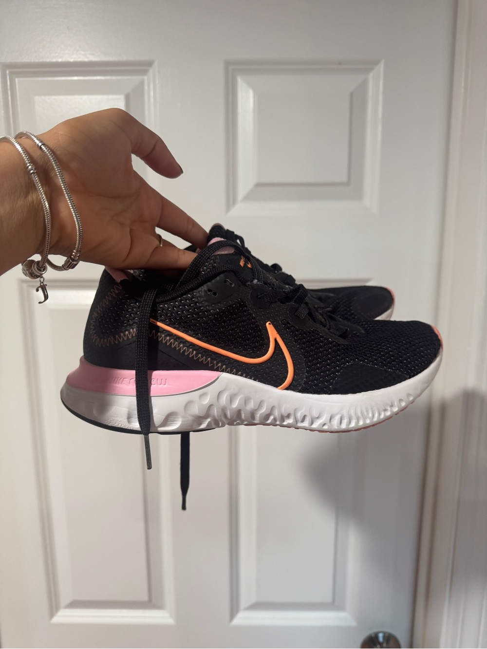Nike Women’s Black Running Sneakers with Pink & Orange Trim